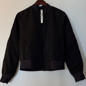 Lululemon Black Reversible Bomber Jacket. Stylish 
Size 8 perfect condition.